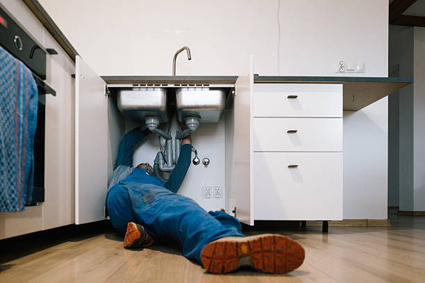 Professional Drain Cleaning technician working in West Chicago, IL